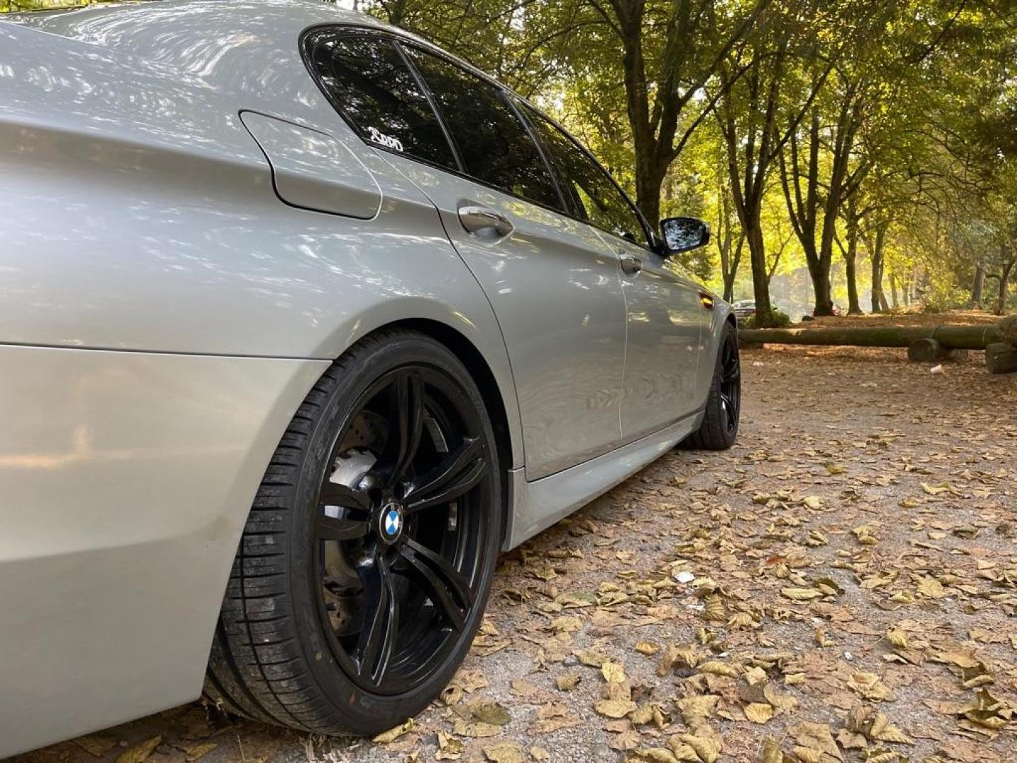 2014 SILVERSTONE 2 METALLIC /Extended Merino Leather Upholstery BMW M5 TWIN-TURBO SPORT PREMIUM (WBSFV9C53ED) with an 4.4L engine, Automatic transmission, located at 1505 S 356th St., Federal Way, WA, 98003, 47.282051, -122.314781 - This M5 is beyond fast: 7-Speed M Double-Clutch w/DriveLogic and 4.4L V8 32V DOHC TWIN-TURBO Engine. COMPETITION PACKAGE with increased horsepower (up to 775 hp), high-gloss black design elements, forged wheels, lowered sport suspension, and an M Sport exhaust system. Modifications: FabSpe - Photo#4