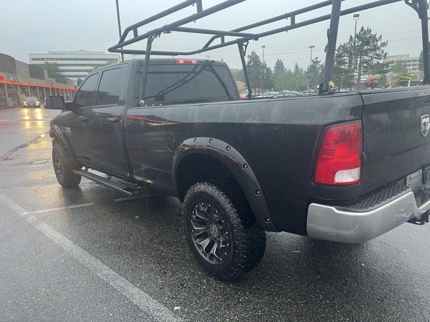 2015 Black Forest Green Pearlcoat /Gray RAM 2500 TRADESMAN CREW CAB LWB ST (3C6UR5HL2FG) with an 6.7L engine, Automatic transmission, located at 1505 S 356th St., Federal Way, WA, 98003, 47.282051, -122.314781 - This Ram 2500 Cummins TurboDiesel 4x4 has a beautiful Black Forest Green Pearlcoat exterior like you've never seen before - ONE OF A KIND! Gooseneck towing package with air suspension, custom grill, running boards, powder coated wood rack. Brand new rotors and pads drilled and slotted, straight pipe - Photo#1