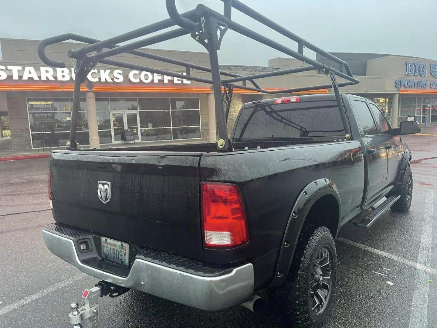 2015 Black Forest Green Pearlcoat /Gray RAM 2500 TRADESMAN CREW CAB LWB ST (3C6UR5HL2FG) with an 6.7L engine, Automatic transmission, located at 1505 S 356th St., Federal Way, WA, 98003, 47.282051, -122.314781 - This Ram 2500 Cummins TurboDiesel 4x4 has a beautiful Black Forest Green Pearlcoat exterior like you've never seen before - ONE OF A KIND! Gooseneck towing package with air suspension, custom grill, running boards, powder coated wood rack. Brand new rotors and pads drilled and slotted, straight pipe - Photo#4